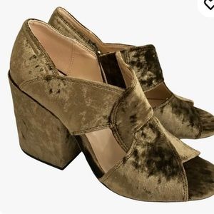 Fabulous moss green velvet heels. Brand new in the box. Size 8.5.